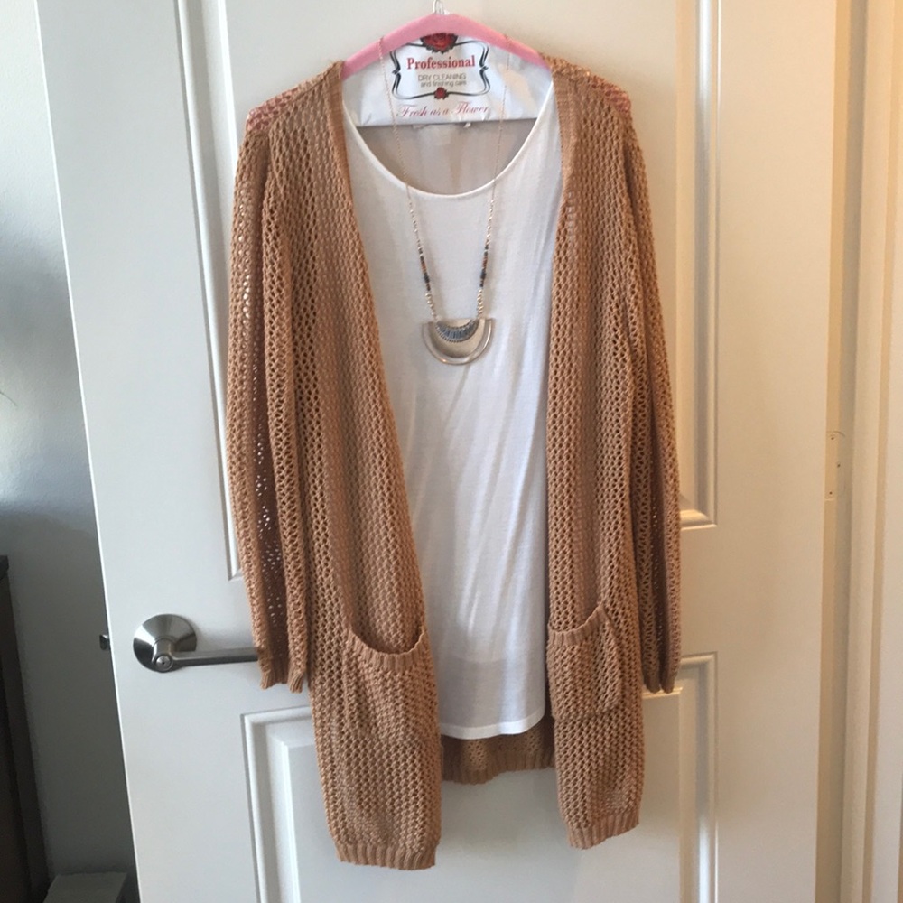 Tan cable-knit cardigan with front pockets